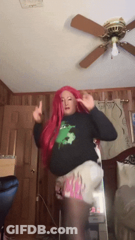 Red Haired Woman Dancing In Bedroom GIF