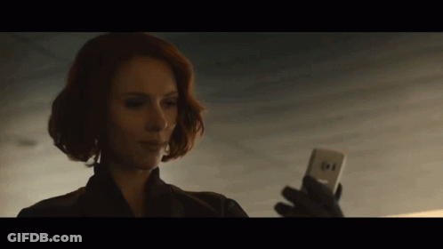 Red Haired Woman Holding Cell Phone GIF
