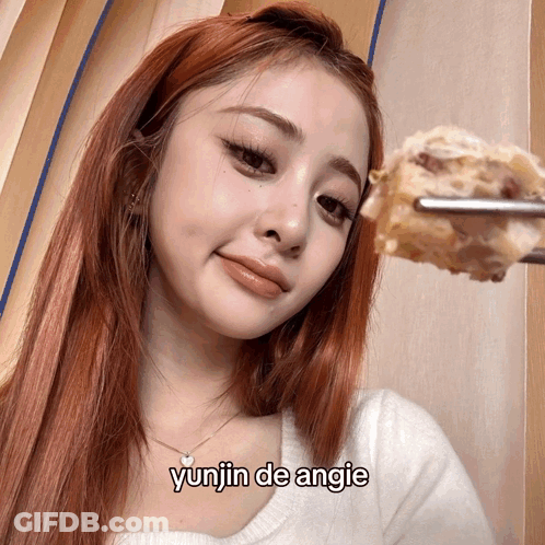 Red-Haired Woman Holding Food Yunjin De Angie GIF