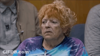 Red-Haired Woman In Blue Purple Tie Dye Sweater GIF