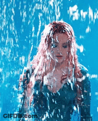 Red-Haired Woman In Pool GIF