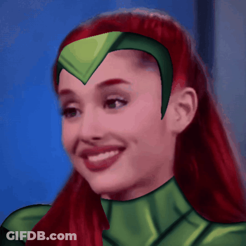 Red-Haired Woman Smiling In Green Costume GIF