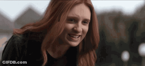 Red-Haired Woman Smiling GIF