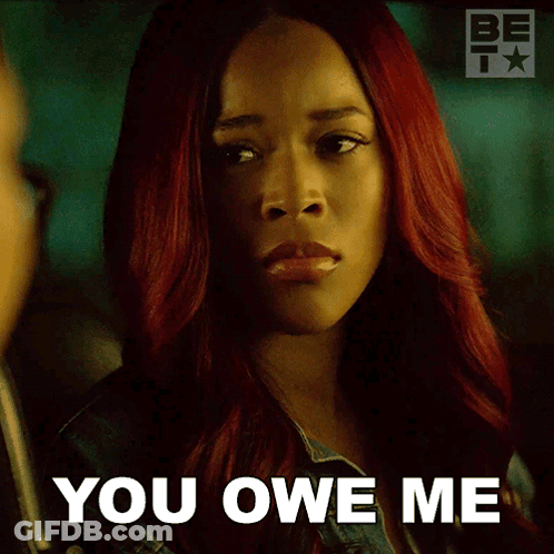 Red-Haired Woman Tells Man You Owe Me GIF