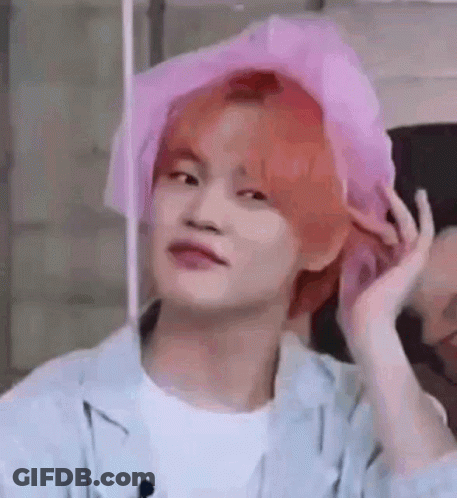 Red-Haired Young Man In Pink Hat Making Funny Face GIF