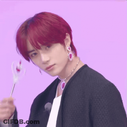 Red-Haired Young Man With Choker And Earrings GIF