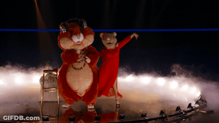 Red Hamster Mascot Dance With Partner On Stage GIF