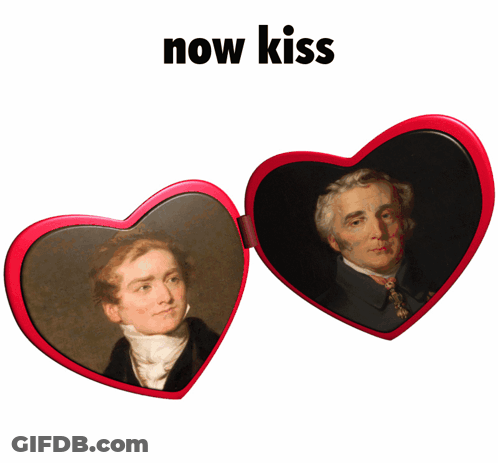 Red Heart Mirror With Two Men Saying Now Kiss GIF