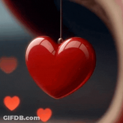Red Heart On String With Hearts Behind GIF