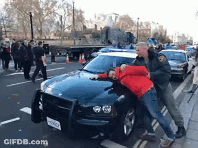 Red Jacket Guy Being Arrested With The Police GIF