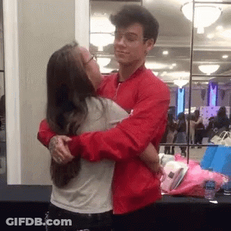Red Jacket Man Peeking What Are You Doing Here GIF