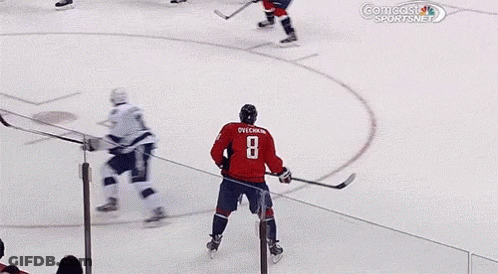 Red Jersey Hockey Player Number 2 Skating GIF