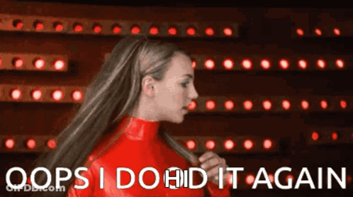 Red Latex Woman Oops I Do It Again GIF