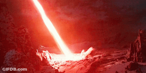 Red Light Coming Out Of Volcano In Night Sky GIF