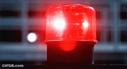 Red Light Lit Up In Darkness GIF