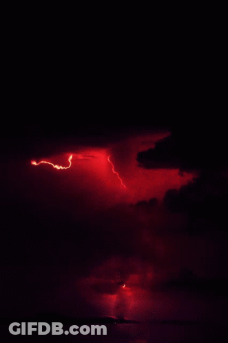 Red Lightning Bolt In Dark Sky GIF