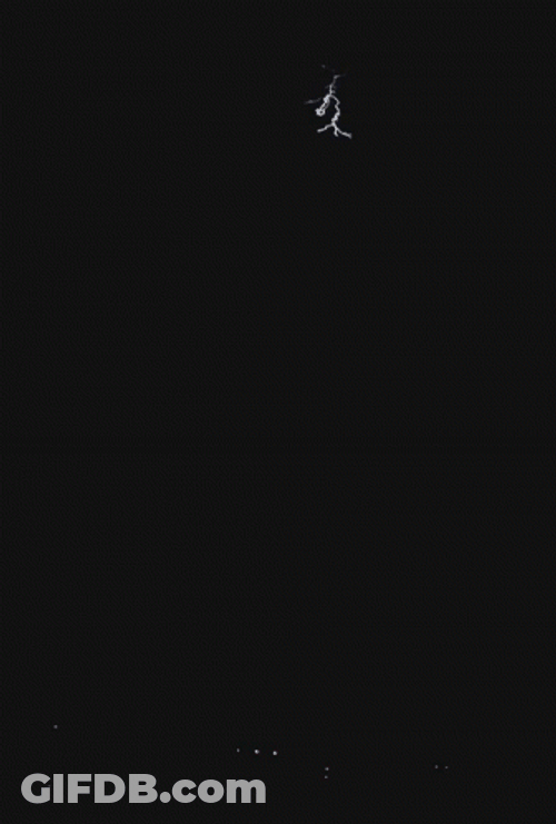 Red Lightning Illuminates The Night GIF