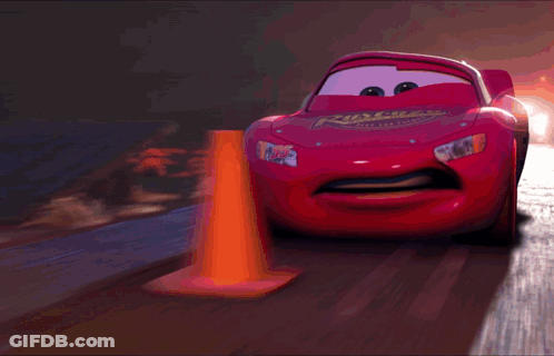 Red Lightning McQueen Driving Down Road GIF