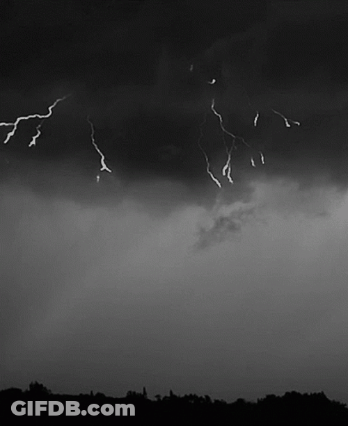 Red Lightning Slowly Crawls Down Sky GIF
