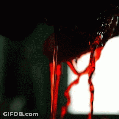 Red Liquid Pouring Into Glass GIF