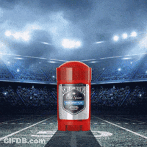Red Old Spice Deodorant Stick In Front Of Stadium GIF
