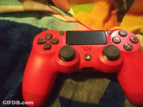 Red PlayStation Controller On Blanket GIF