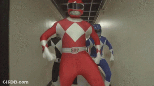Red Power Ranger In Hallway With Two Others GIF