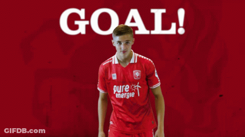 Red Pure Energie Soccer Player Pointing At Goal GIF