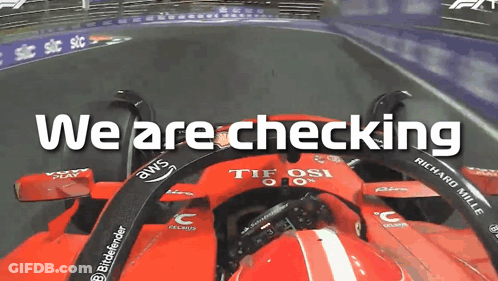 Red Race Car Saying We Are Checking GIF