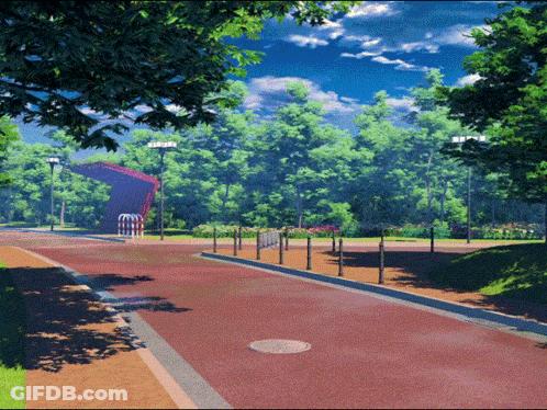Red Road With Manhole Cover GIF