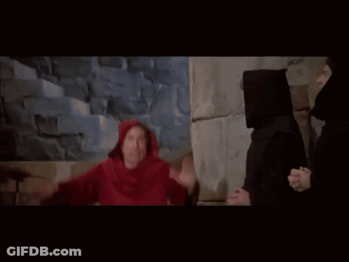 Red Robe Man Next To Black Robe Man GIF