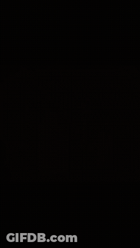 Red Robot With Glowing Eyes And Hood GIF