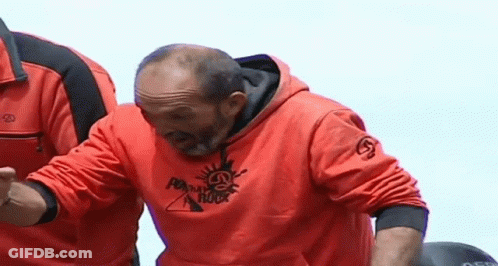 Red Rock Sweatshirt Man Looking Down GIF