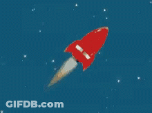 Red Rocket Flying Through Blue Sky GIF