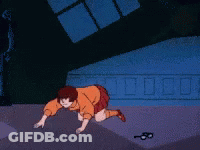 Red Shirt Man Holding Paper Near Rezen Blackboard GIF