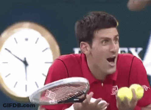 Red Shirt Man Holding Tennis Racquet And Balls GIF
