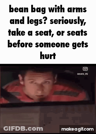Red Shirt Man In Car With Bean Bag Creature GIF