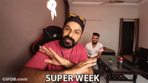 Red Shirt Man Says Super Week To Another GIF