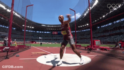 Red Shirt Man Throwing Disc In Stadium GIF