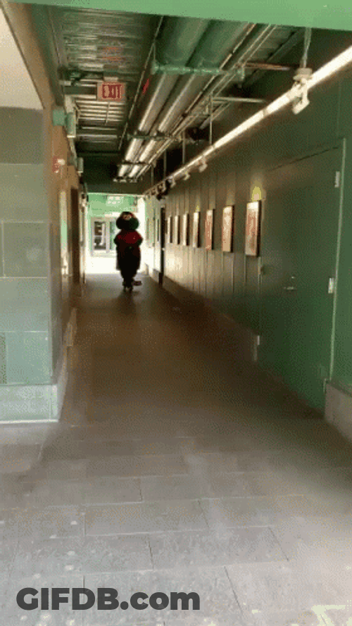 Red Sox Green Monster Riding A Scooter GIF