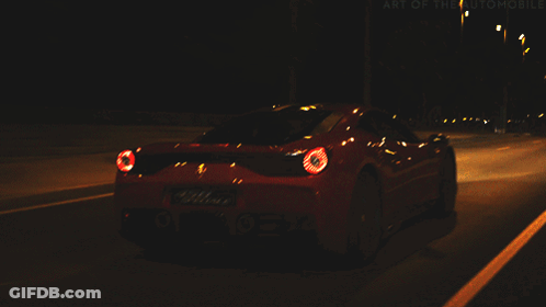 Red Sports Car Driving At Night GIF