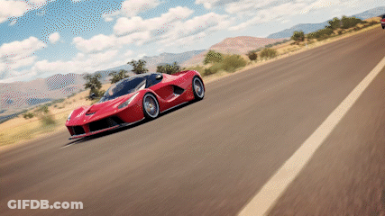 Red Sports Car Driving Down Road GIF