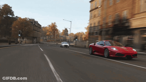 Red Sports Car Driving Next To White Sports Car GIF