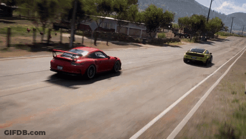 Red Sports Car Driving Next To Yellow Car GIF