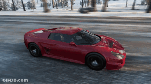 Red Sports Car Driving On Snowy Road GIF