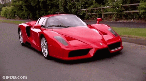 Red Sports Car Driving With GKC License Plate GIF