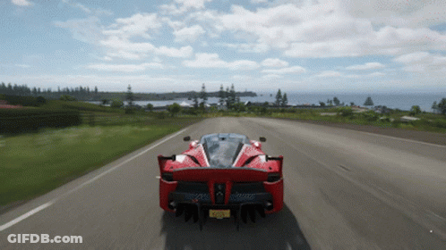 Red Sports Car Driving With New York License Plate GIF