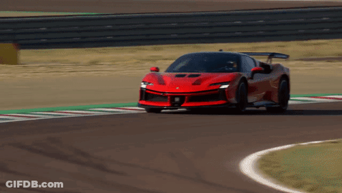 Red Sports Car On Race Track GIF