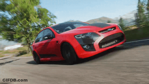 Red Sports Car With Black Hood Driving GIF