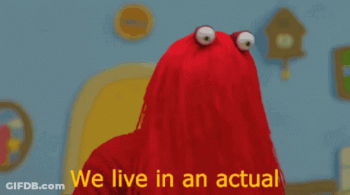 Red Stuffed Animal In Front Of Nightmare Sign GIF